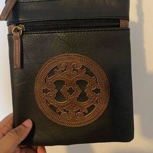 Brand NEW crossbody purse! Still has tags on it!
